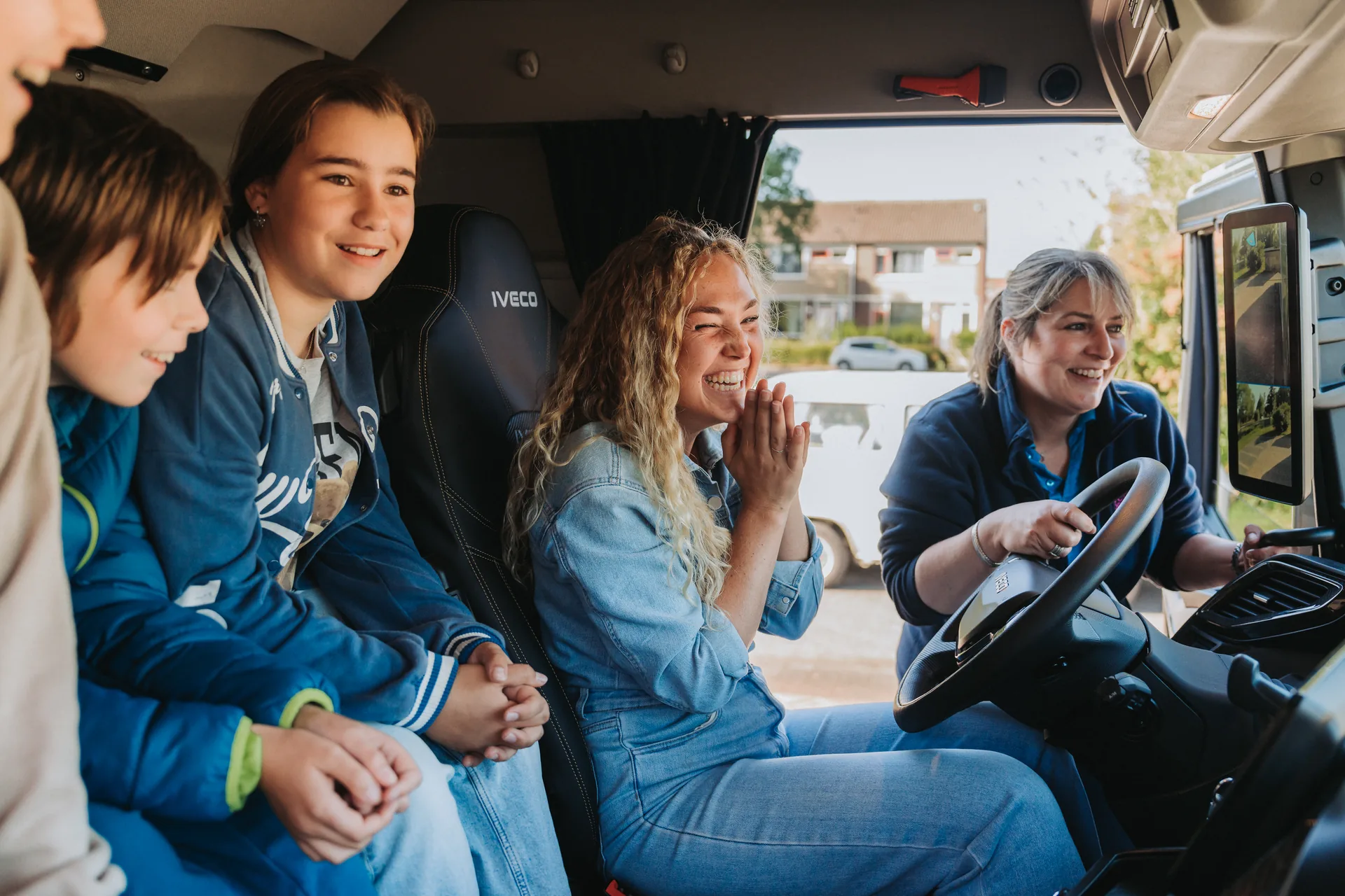 Pupils and instructors during the practical lesson in the truck cab
